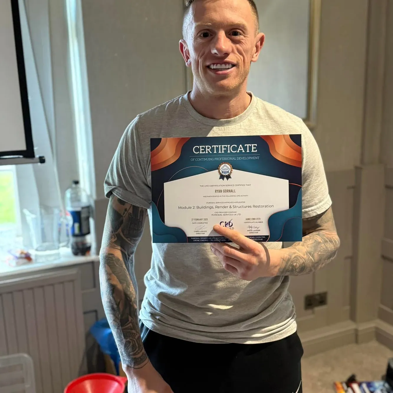 Ryan Gornall of Elite Jetwashing Services with his Module 2 chemical-handling certificate