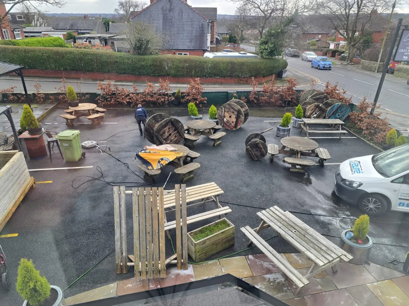 The same beer garden after commercial pressure washing, surface clean