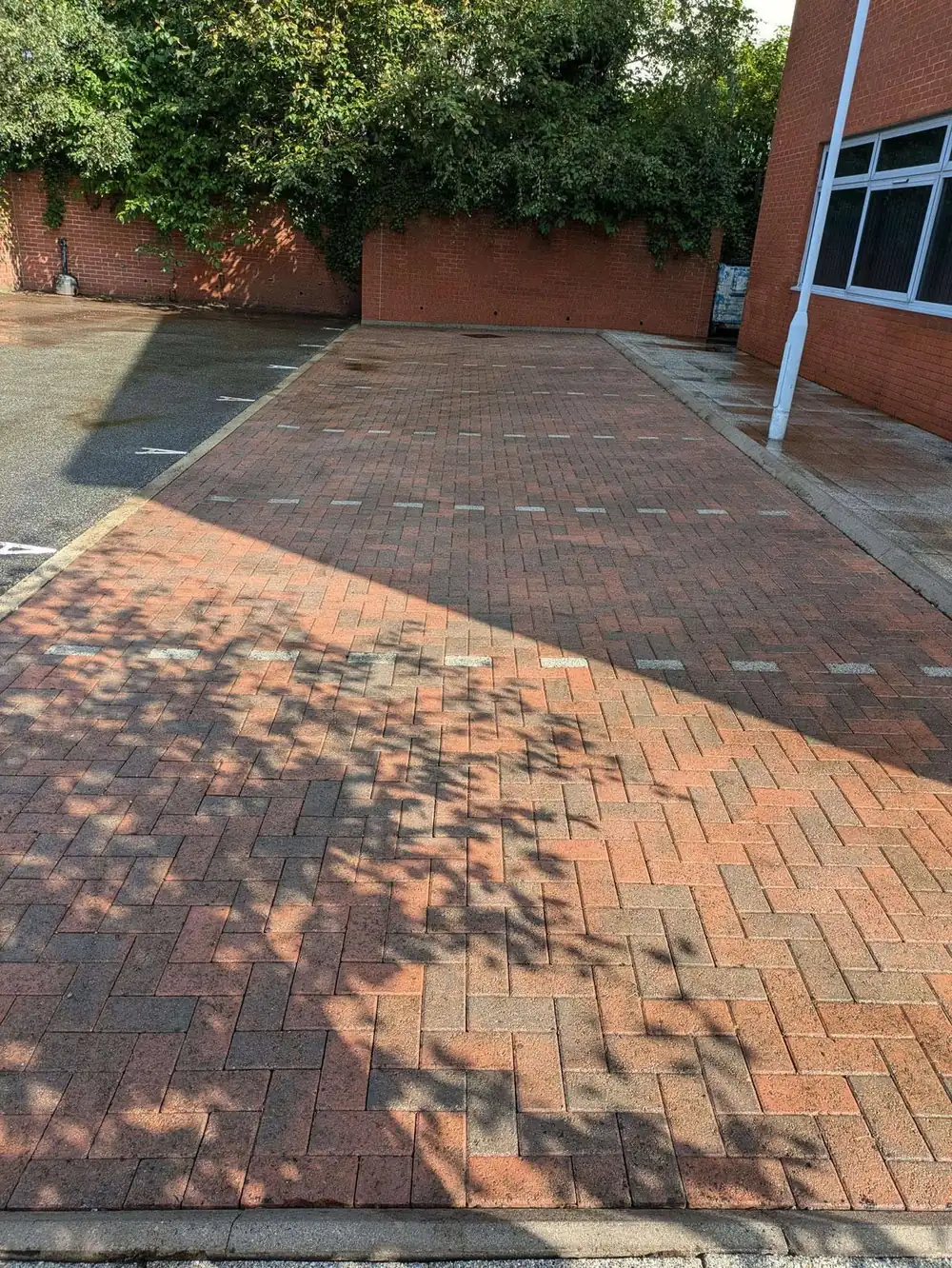 The same office paving after pressure washing, colour restored