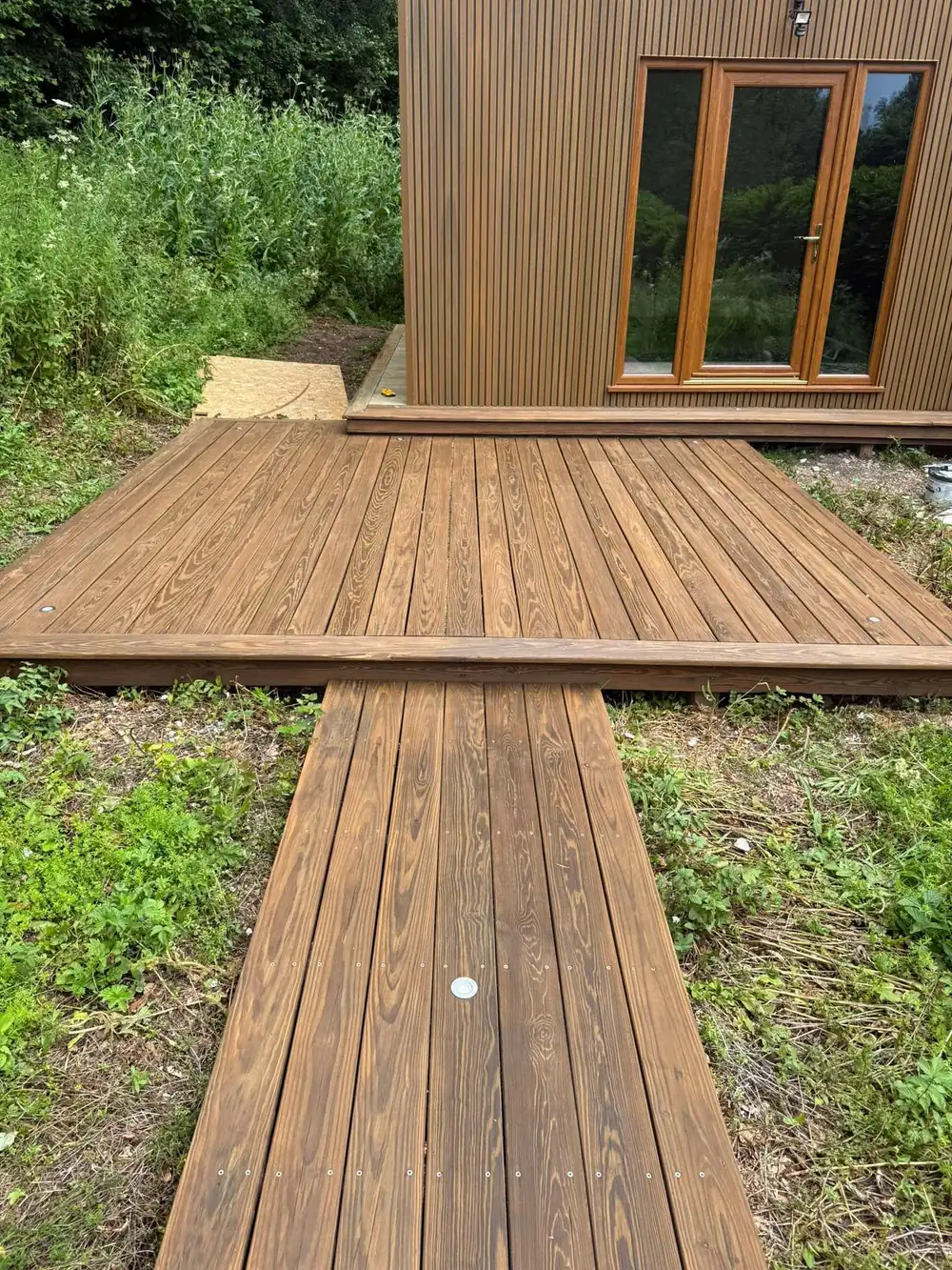 The same decking after cleaning, back to bare timber