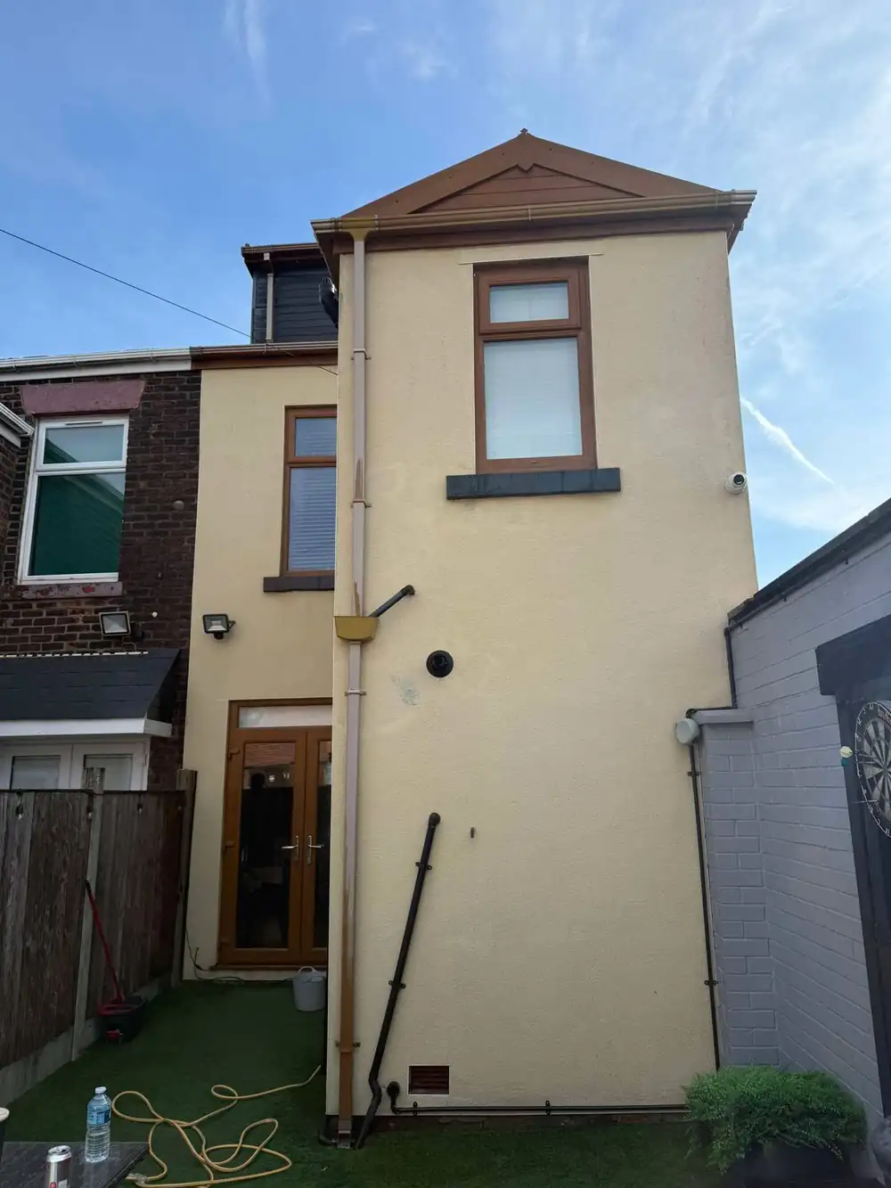 The same rendered gable after soft washing