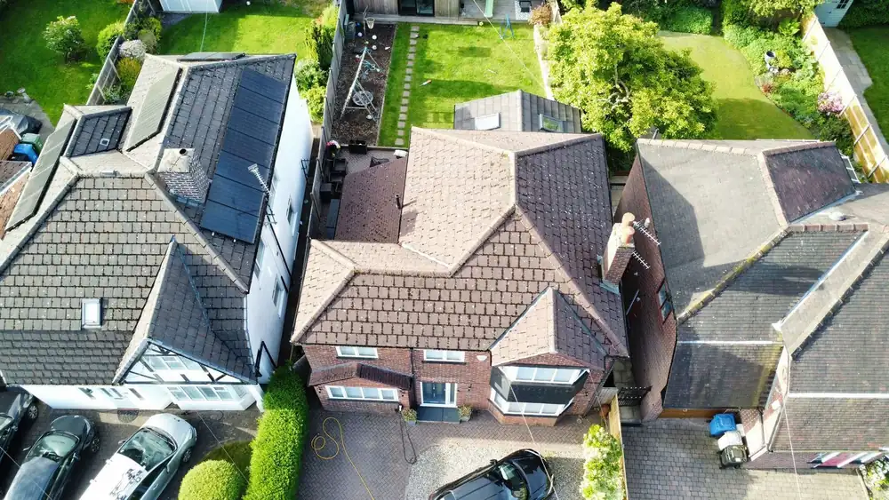 Dark, dirty roof before cleaning, aerial drone photo