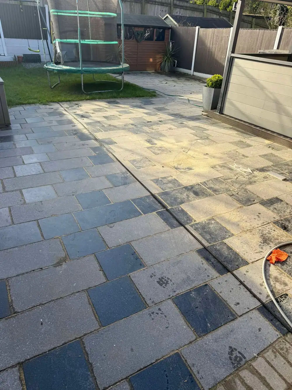 Faded, dirty charcoal slate patio before cleaning